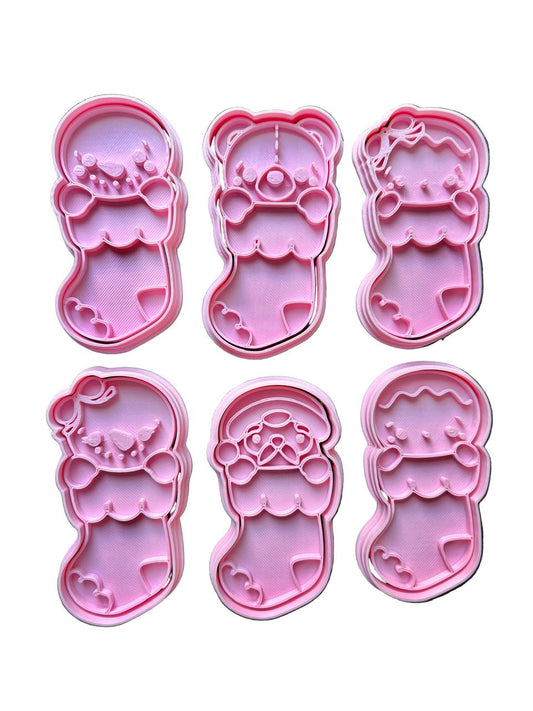 Set Cortadores más marcadores de galletas, galletas de jengibre en calcetas navideñas