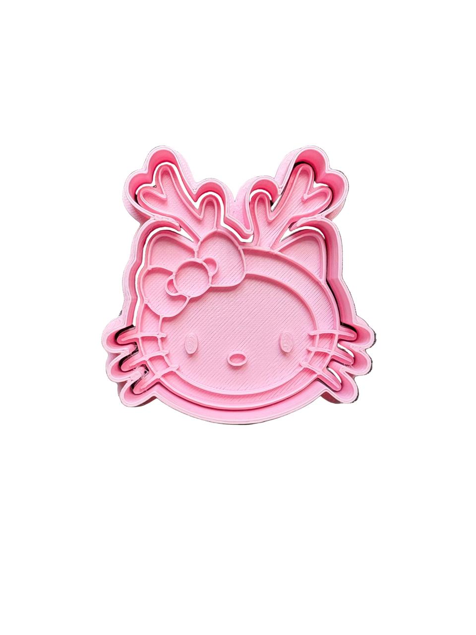 Cortador más marcador de galletas ,Hello kitty cuernos navidad